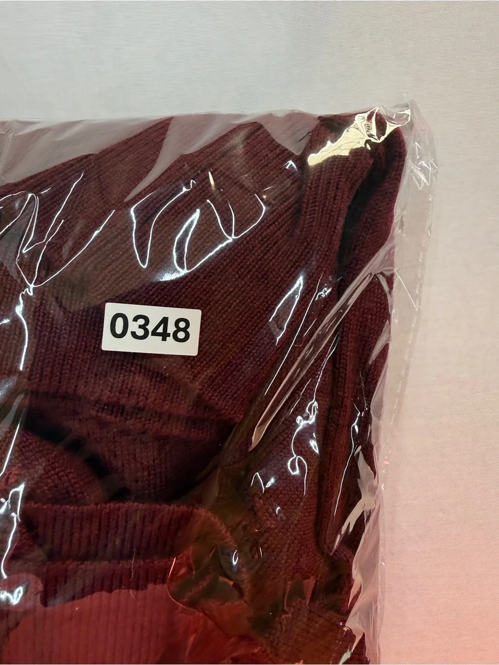 Men's V-Neck Sweater in Burgundy by Belford. Made of extra fine Merino Wool.